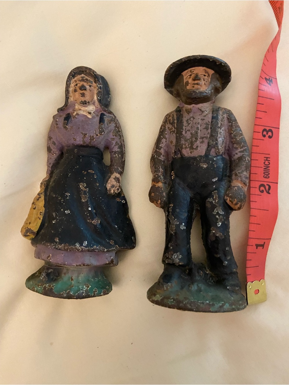 Vintage Cast Iron Amish Farmer & Woman Figurine Pair - heavily chipped paint